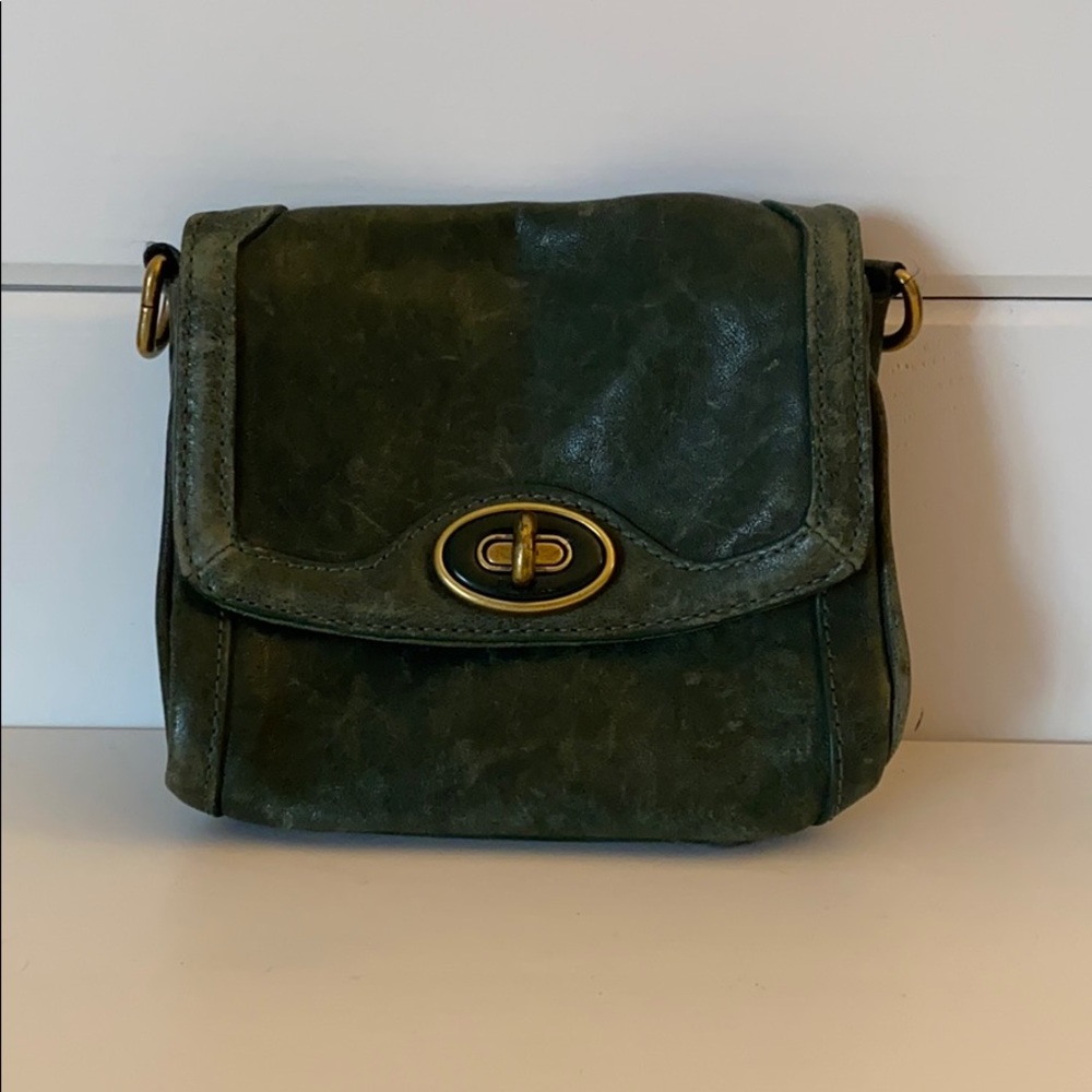 Solid leather green fossil clutch